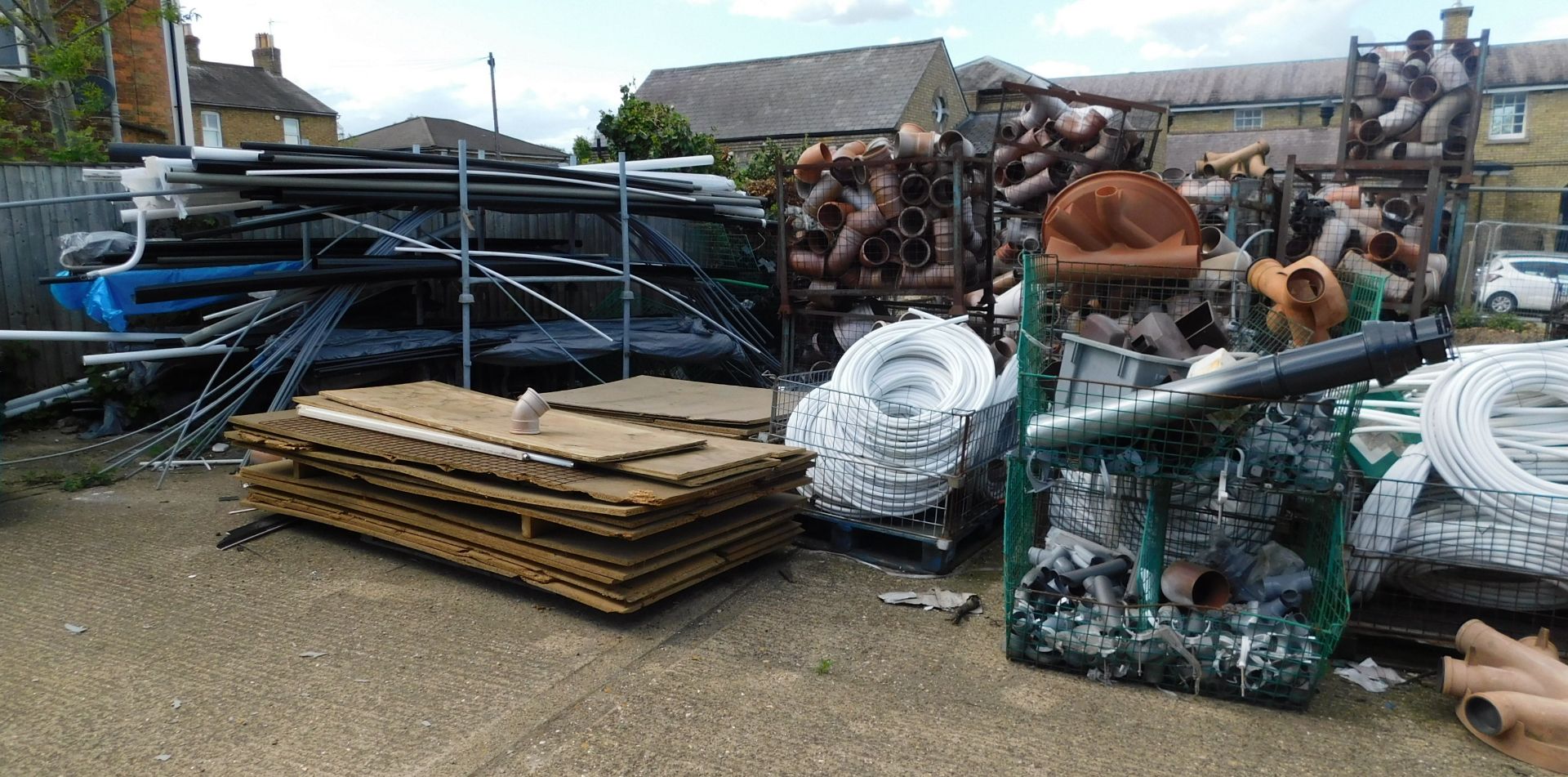 Large Quantity of Stillages & Crates to Include Soil Pipes, Fittings, Clips, Guttering etc. (