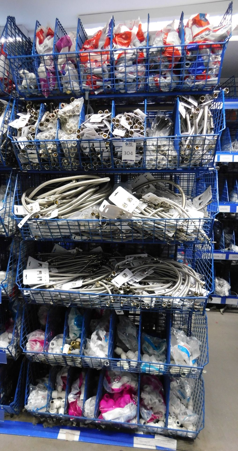 64 Plastic Coated Baskets & Contents of Flexible Connectors etc. (Location Chingford. Please Refer
