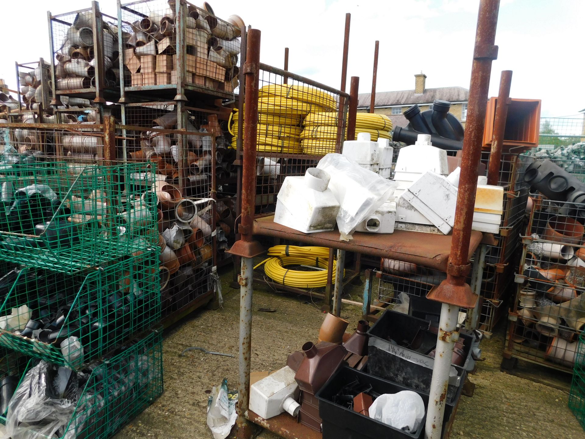 Large Quantity of Stillages & Crates to Include Soil Pipes, Fittings, Clips, Guttering etc. ( - Image 16 of 18