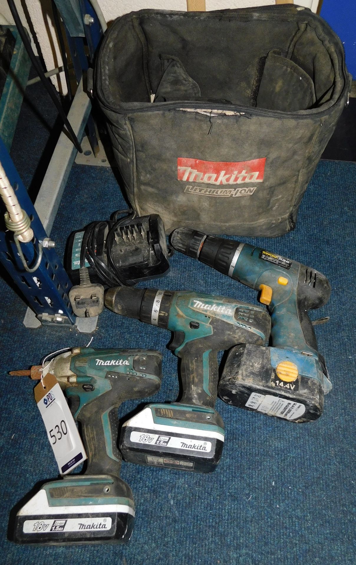 Makita Drill, Makita Impact Driver 2 Batteries Charger & Workzone Cordless Drill (Location: