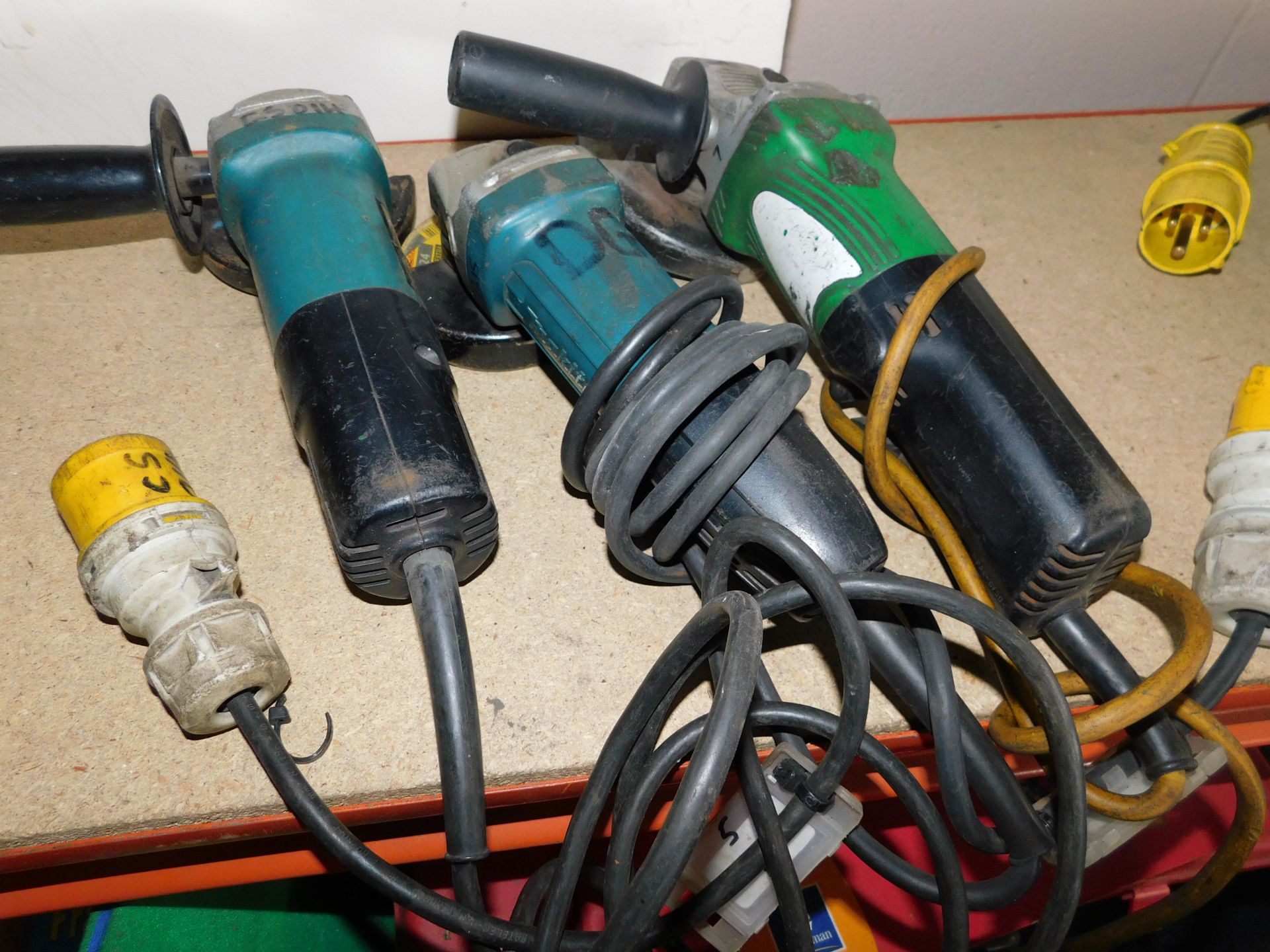 2 Makita & Hitachi Angle Grinders (Location: Stockport. Please Refer to General Notes)