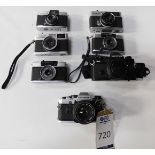 7 Various Olympus Digital & Vintage Film Cameras. (See Image for Full List ) (Location: Brentwood.