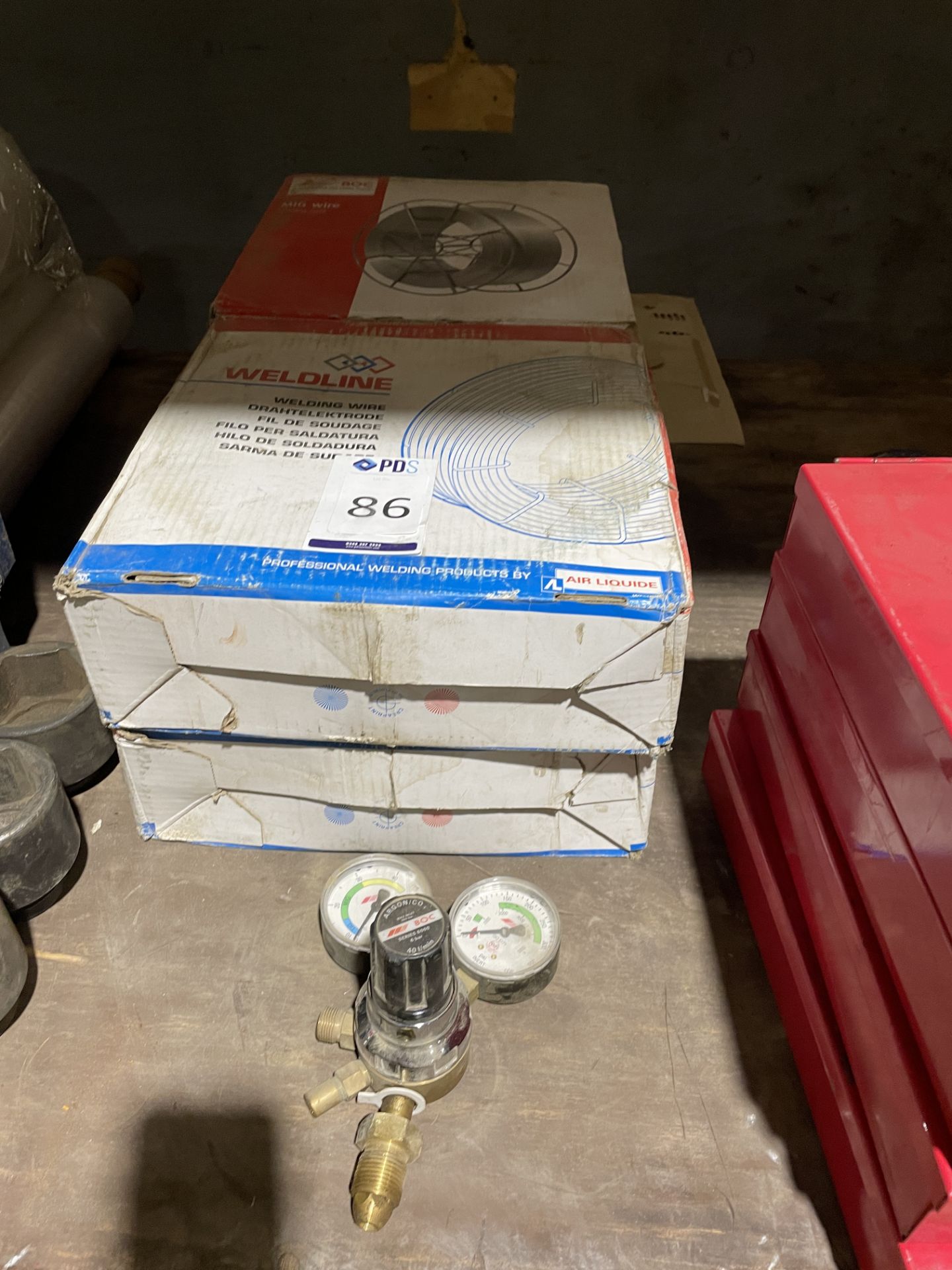 4 Boxes MIG Welding Wire with a Welding Regulator (Location Rochester. Please Refer to General