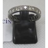 Diamond full hoop eternity ring. 2.9g approx. Ring size L. Unmarked. (B.P. 21% + VAT)