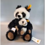 Modern Steiff 'Cha Cha' panda mother and cub in black and white mohair, in original box with COA. (