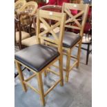Pair of pale oak and leather bar/breakfast stool. (2) (B.P. 21% + VAT)