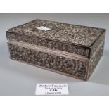 Indian silver rectangular shaped repousse decorated cigarette box with hinged cover. 9.4 troy ozs