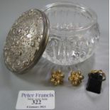 Glass dressing table jar with repousse plated top containing 14ct gold ring set with a white stone