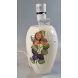 Modern Moorcroft art pottery tube lined table lamp base, overall with flowers and foliage,