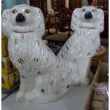Pair of Staffordshire fireside seated spaniels. (B.P. 21% + VAT)