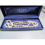 A string of cultured pearls with a14ct gold bead clasp. (B.P. 21% + VAT)