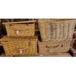 Three modern wicker picnic hampers and a wicker basket. (4) (B.P. 21% + VAT)