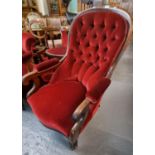Victorian walnut upholstered button back show frame fireside armchair. (B.P. 21% + VAT)