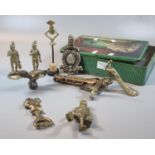 Tin box comprising assorted brass items; peacock and eagle car mascots, Gibraltar crest, figurines