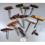 Collection of antique and vintage corkscrews, various, with turned wooded and bone handles. (B.P.