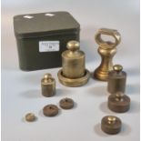 Tin box of assorted brass weights. (B.P. 21% + VAT)