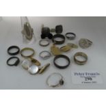 Four silver rings and a collection of costume jewellery rings and cufflinks. (B.P. 21% + VAT)
