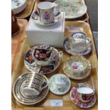 Collection of seven 20th Century collectors cups and saucers: miniature Irish Royal Tara cup and