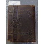 Moroccan leather leaf design Victorian photo album containing; various photographs and postcards. (