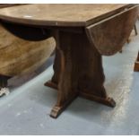 Early 20th century oak drop leaf table on shaped quatrefoil base. (B.P. 21% + VAT)