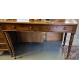 Victorian mahogany two drawer desk/side table standing on baluster ring turned legs, cups and