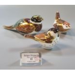 Three Royal Crown Derby bone china paperweights, 'Woodland pheasant', 'Willow tit' and another.