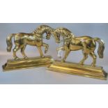 Pair of brass doorstops in the form of horses. (2) (B.P. 21% + VAT)