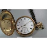 A Waltham yellow metal engraved full hunter keyless lever top wind pocket watch with stag decoration
