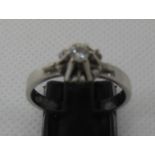 18ct white gold and diamond solitaire ring. Ring size P. Approx weight 4.1 grams. (B.P. 21% + VAT)