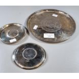 Oriental white metal salver with Islamic text and two coin set white metal dishes with 'Maria Teresa