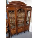 Edwardian mahogany inlaid three door glazed display cabinet standing on tapering legs and spade