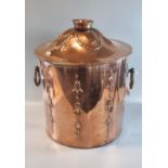 Arts and Crafts design copper lidded two handled log/coal bin with repousse swag decoration. (B.P.
