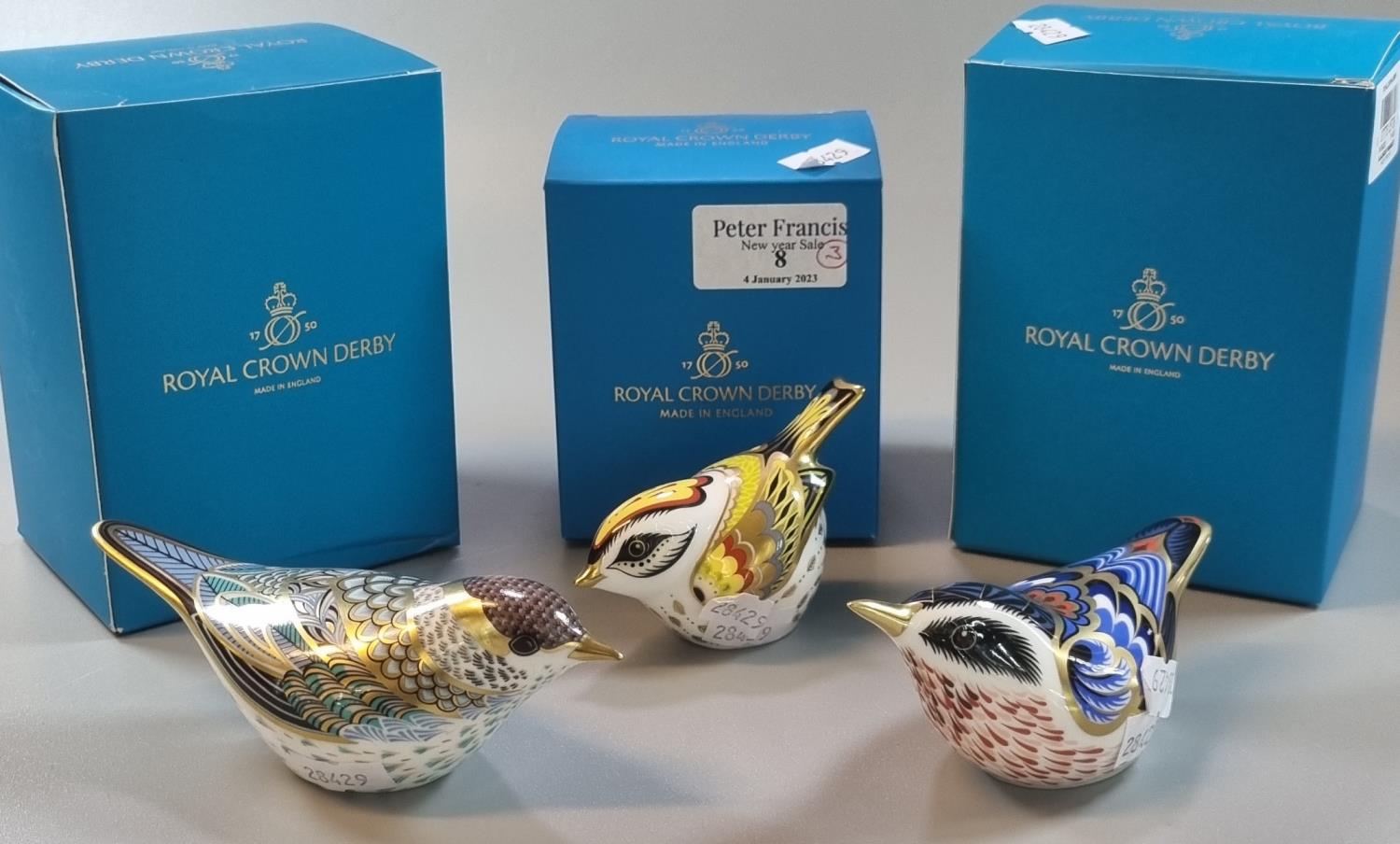 Three Royal Crown Derby bone china paperweights, 'Flamecrest', 'Garden nuthatch' and 'Blackcap