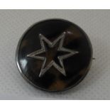 Tortoiseshell silver mounted star design brooch. (B.P. 21% + VAT)