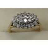 9ct gold boat shaped diamond cluster ring. 4 grams approx. Ring size N. (B.P. 21% + VAT)