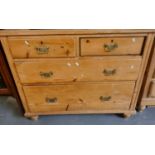 Late Victorian pine straight front chest of two short and two long drawers on baluster turned