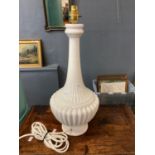 Modern white ceramic table lamp of fluted form. (B.P. 21% + VAT)