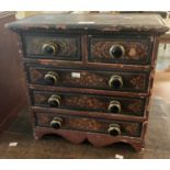 Painted mine miniature straight front chest of two short and three long drawers with turned