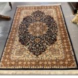 Persian design beige ground floral and foliate carpet with flowerhead boarders. 187x127cm approx. (