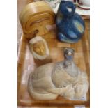 Tray of artifacts: tree shaped wooden box with drawer, carved figure of a woman with a pumpkin,