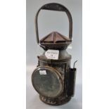 See lot 29, a probably second world war period hand lantern with interchangeable lens, lacking