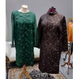 Two 1960's brocade long sleeved shift dresses; one in green with floral pattern, stripes down the