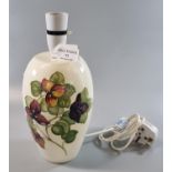 Modern Moorcroft art pottery tube lined table lamp base, overall with flowers and foliage,