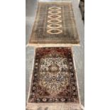 Middle Eastern design pink ground carpet with geometric, floral and foliate designs with central