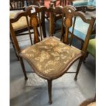 Edwardian mahogany upholstered corner chair on X frame support. (B.P. 21% + VAT)