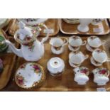 Tray of Royal Albert 'Old Country Roses' coffee ware: six coffee cups and saucers, coffee pot, sugar