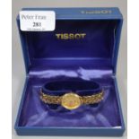 Tissot lady's gold plated wristwatch, appearing in original box, with original receipt. (B.P.