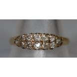 18ct gold and diamond and white stone boat shaped ring. Ring size X. Approx weight 2.7 grams. (B.