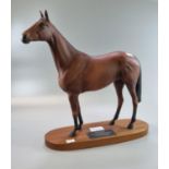 Beswick model of Red Rum, 'Winner of the Aintree Grand National 1973, 74 and 77 and the Scottish