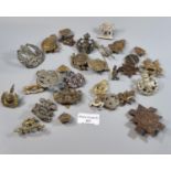 Collection of various British Army cap badges, including: Gloucestershire Regiment, Lancashire